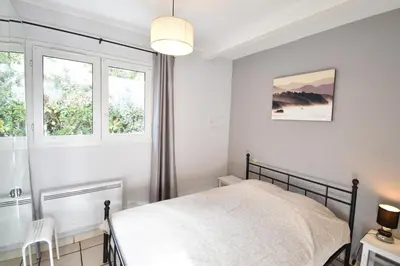 Un ou plusieurs lits dans un hébergement de l'établissement Aire Ona 1 - Hossegor appartement situé à deux pas de la plage de la gravière