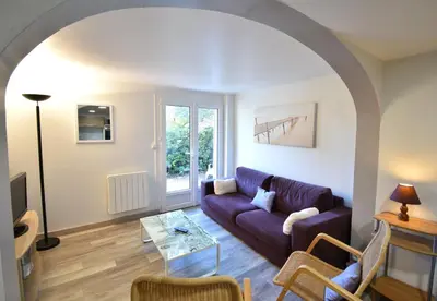 Coin salon dans l'établissement Aire Ona 2 - Hossegor appartement situé à proximité de la plage de la gravière