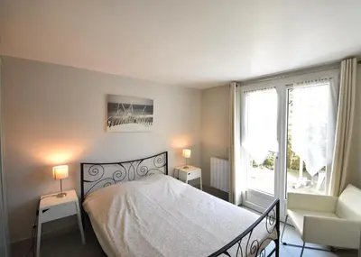 Un ou plusieurs lits dans un hébergement de l'établissement Aire Ona 2 - Hossegor appartement situé à proximité de la plage de la gravière