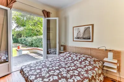 Un ou plusieurs lits dans un hébergement de l'établissement Itsala - Hossegor agréable villa entre canal et océan à 3 minutes à pied de la plage