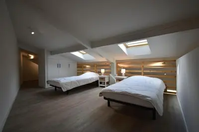 Un ou plusieurs lits dans un hébergement de l'établissement Maisonnette - Hossegor agréable maisonnette entre lac et océan