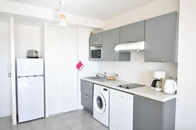 Cuisine ou kitchenette dans l'établissement Estacade - Capbreton en front de mer à deux pas de l'océan proche restaurants