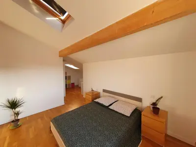 Un ou plusieurs lits dans un hébergement de l'établissement Maison à Tosse proche des plages