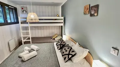 Un ou plusieurs lits dans un hébergement de l'établissement La Villa du Lac - piscine chauffée - Jacuzzi - clim
