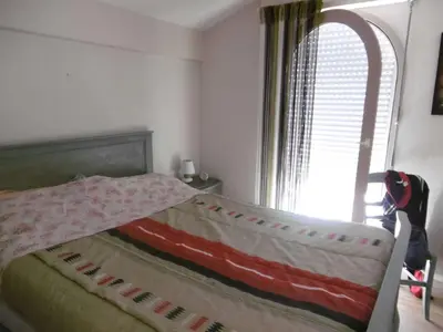 Un ou plusieurs lits dans un hébergement de l'établissement Biscarrosse Lac Villa 2 chambres et jardin à Navarrosse