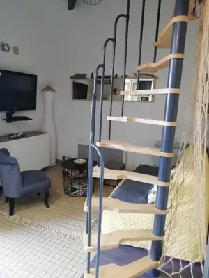Télévision ou salle de divertissement dans l'établissement Joli appart. entre Biarritz et Bordeaux à Moliets
