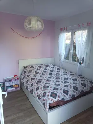 Un ou plusieurs lits dans un hébergement de l'établissement Villa la p'tite guinguette