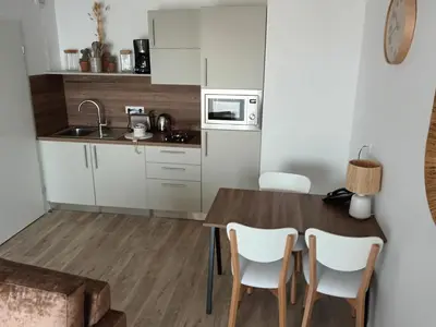 Cuisine ou kitchenette dans l'établissement Domitys Les Craies Blanches