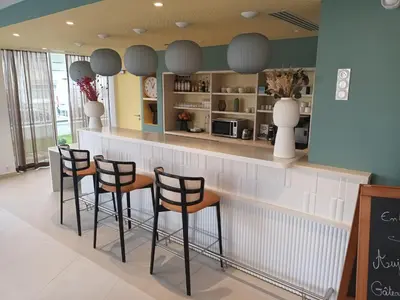 Cuisine ou kitchenette dans l'établissement Domitys Les Craies Blanches