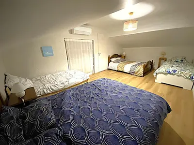 Un ou plusieurs lits dans un hébergement de l'établissement Location vacances maison avec piscine sauna spa proche plages