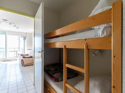 Un ou plusieurs lits dans un hébergement de l'établissement Mimizan Plage: Appartement 6 pers. avec balcon et parking - FR-1-50-114