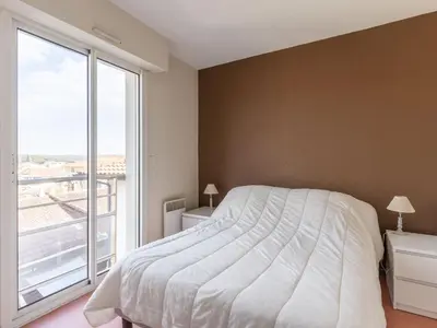 Un ou plusieurs lits dans un hébergement de l'établissement Mimizan Plage: Appartement 6 pers. avec balcon et parking - FR-1-50-114