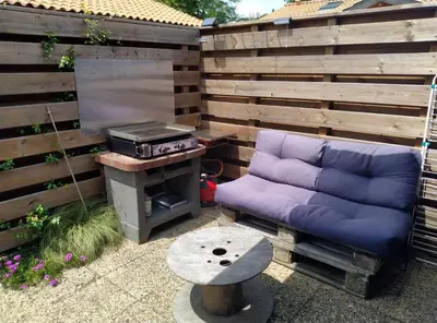 Barbecue disponible mis à disposition des clients de la maison de vacances