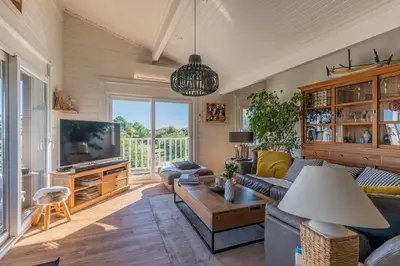 Télévision ou salle de divertissement dans l'établissement Villa Perle du Bassin Vue Mer - Arcachon-La Hume