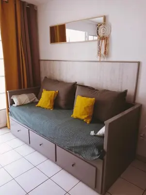 Coin salon dans l'établissement Appartement Golf et Océan