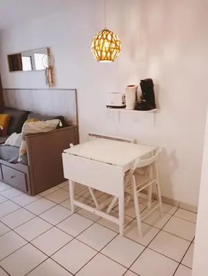 Télévision ou salle de divertissement dans l'établissement Appartement Golf et Océan