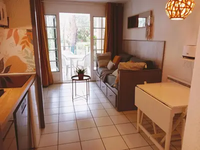 Coin salon dans l'établissement Appartement Golf et Océan