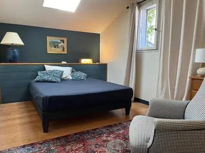Un ou plusieurs lits dans un hébergement de l'établissement Maison de charme avec piscine
