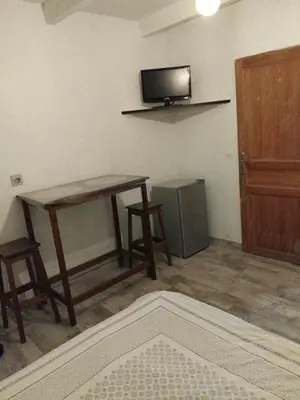 Télévision ou salle de divertissement dans l'établissement Studio au porte d'entrée de DAX
